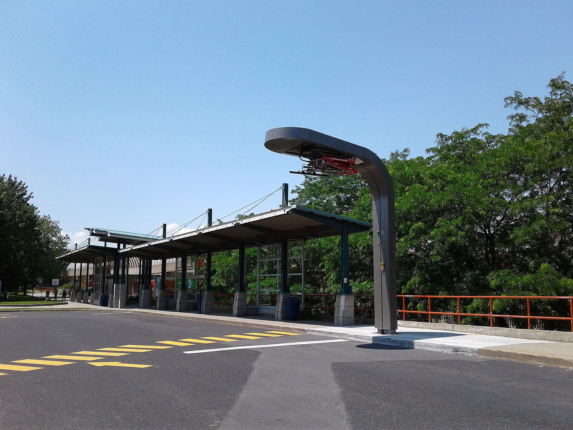 Electric bus charging infrastructure at Montreal's Angrignon station.