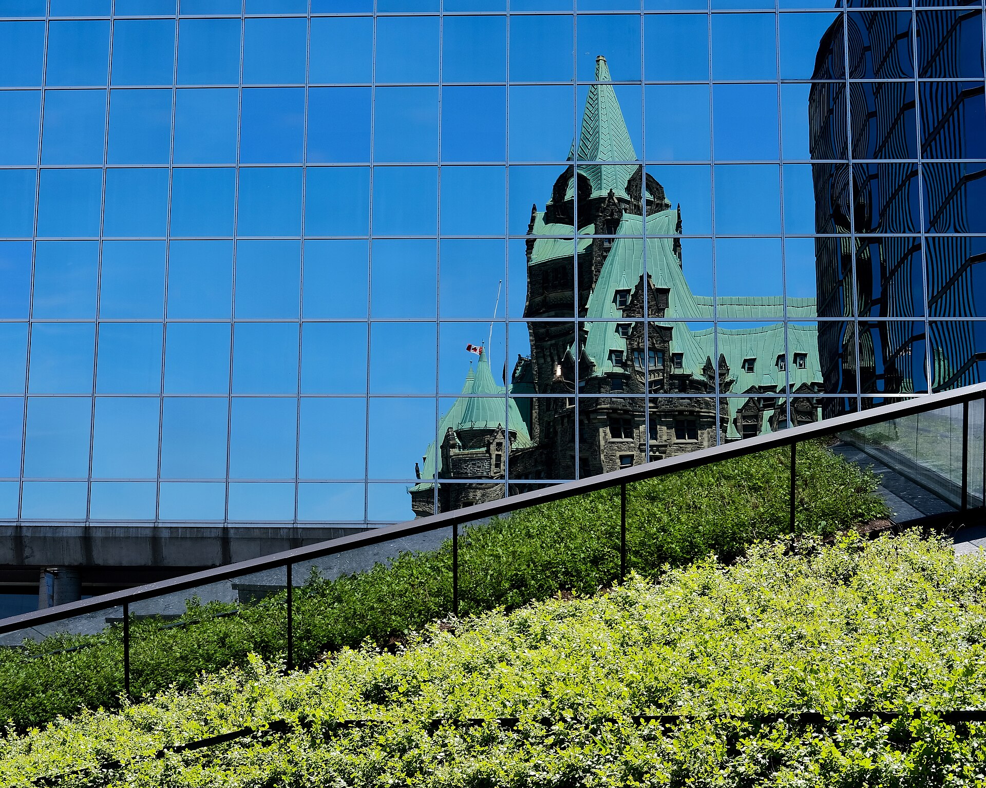 Reflection of Parliament's West Block in the C.D. Howe Building in Ottawa.